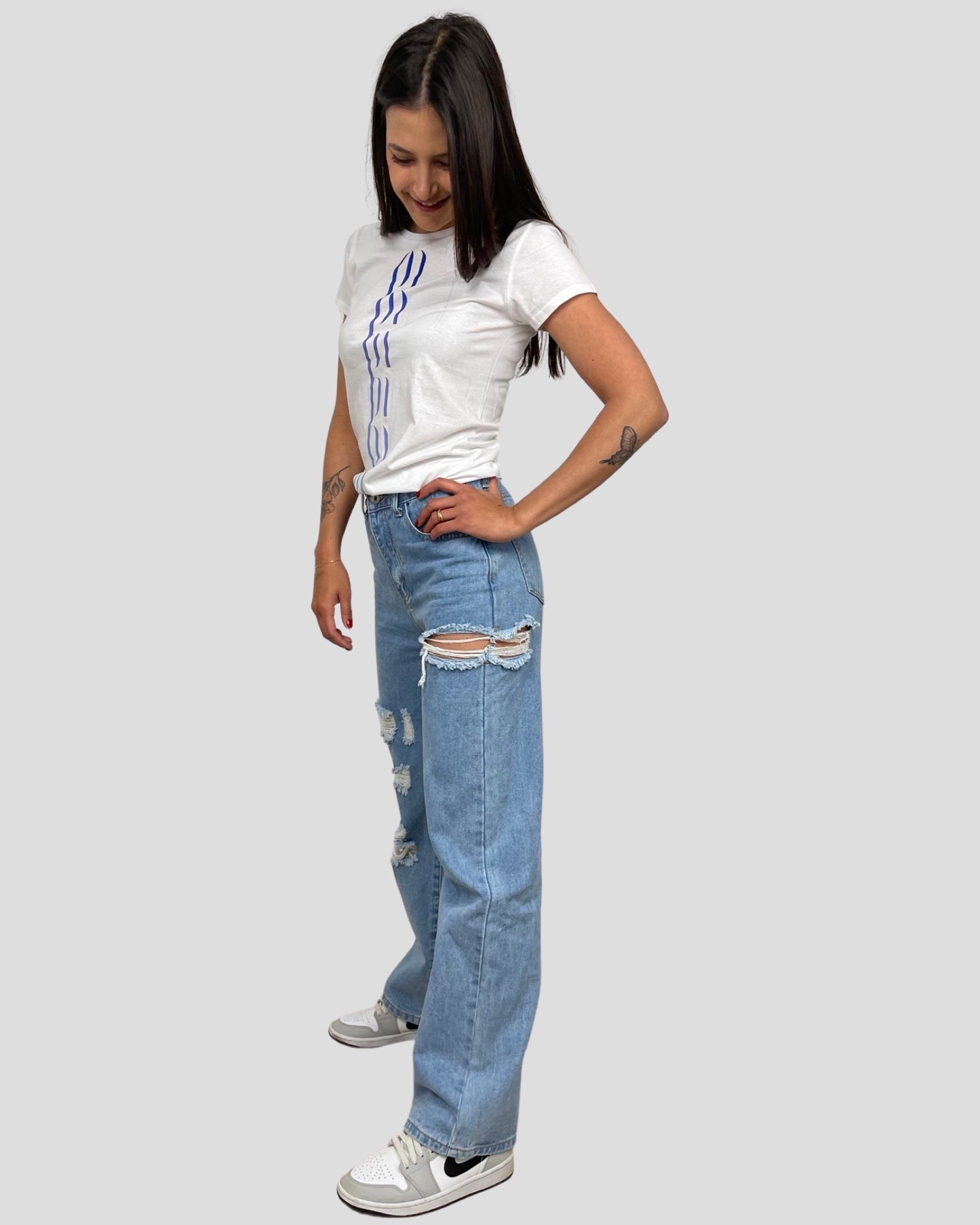 Jeans wide leg con strappo